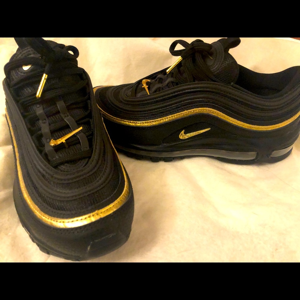 Size men 8 Nikes 97s black and gold never been worn bought brand new!!!!